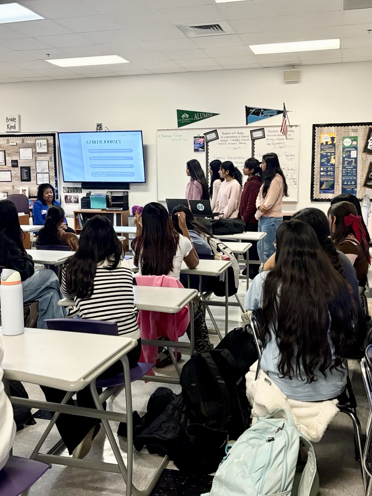 Students listening to a speaker session